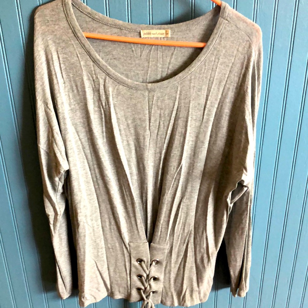 Long sleeve, tied at the bottom.